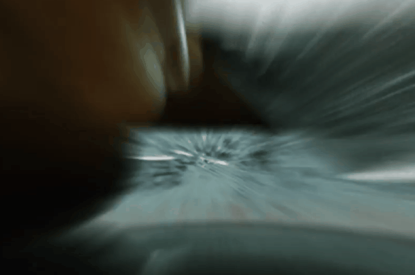 Close-up of damaged window tint film with bubbling and distortion