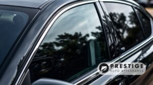 Close-up of a vehicle with tinted windows by Prestige Auto Appearance in Allentown, PA.